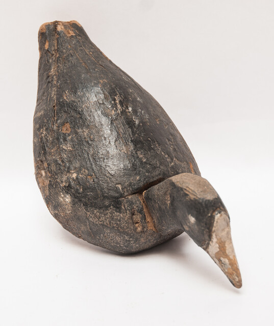 A wooden painted Dutch decoy bird in the form of a coot.