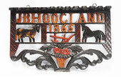 A wooden painted piperack dated 1865.