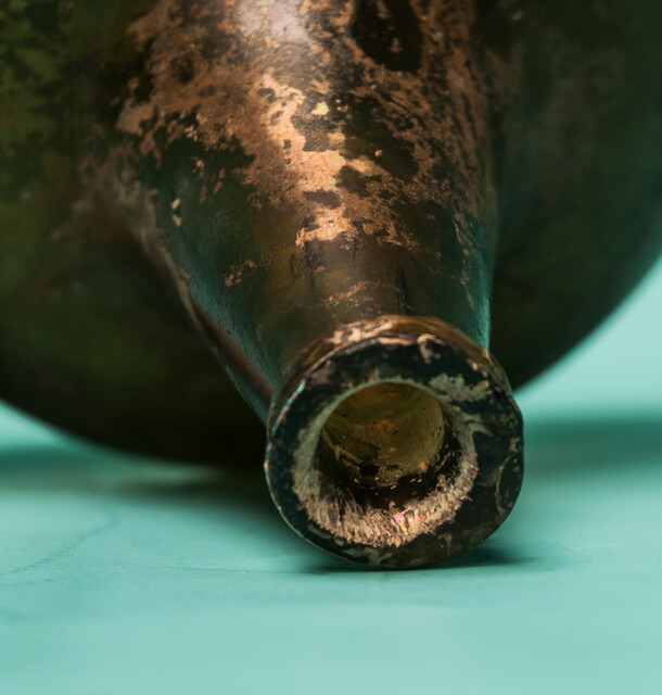 An 18th C. Dutch beautifully iridescent wine bottle from a shipwreck. 