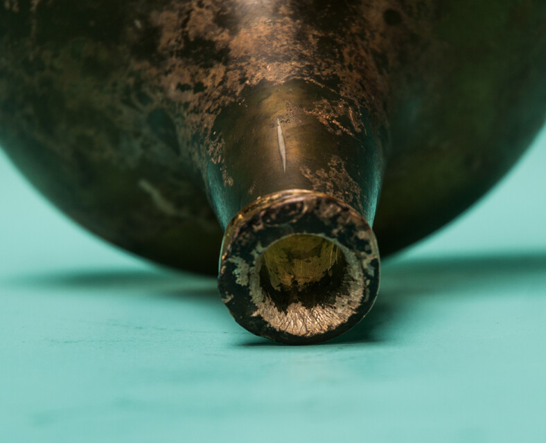 An 18th C. Dutch beautifully iridescent wine bottle from a shipwreck. 