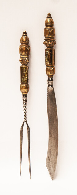 An 18th C. elegant brass set of knife and fork with inlay of mother of pearl. The knife signed 