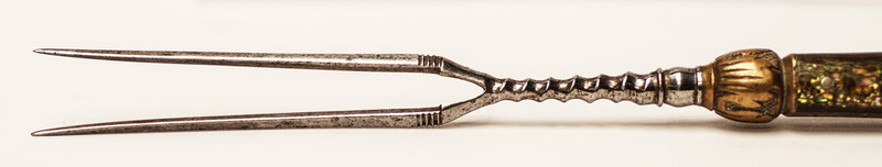 An 18th C. elegant brass set of knife and fork with inlay of mother of pearl. The knife signed 