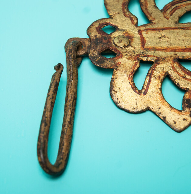 An 18th C. wrought iron guilt pennant board.