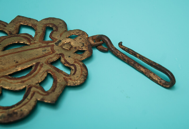 An 18th C. wrought iron guilt pennant board.