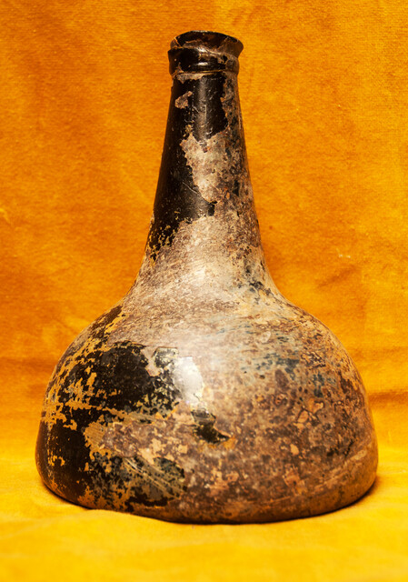 An early 18th C. wine bottle from a Dutch shipwreck.