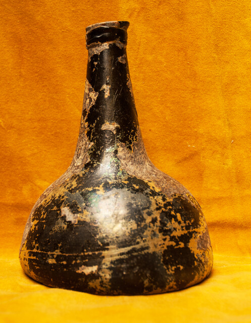 An early 18th C. wine bottle from a Dutch shipwreck.