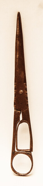 An early eighteenth century folding scissors with a blacksmiths touch mark.