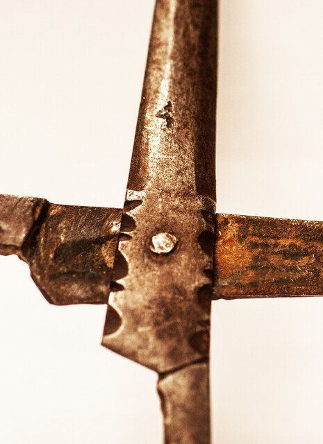 An early eighteenth century folding scissors with a blacksmiths touch mark.