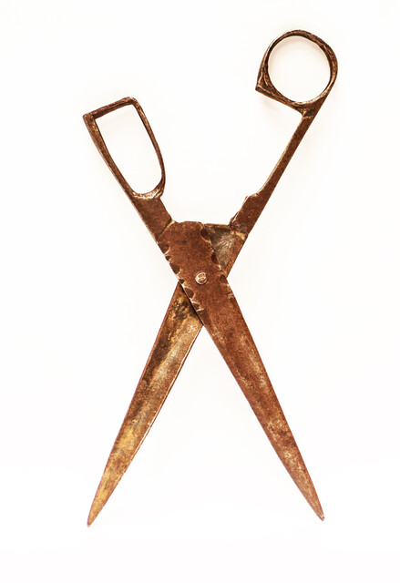 An early eighteenth century folding scissors with a blacksmiths touch mark.