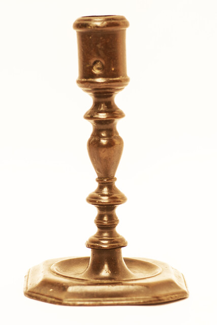 An early seventeenth century bronze Dutch candlestick.