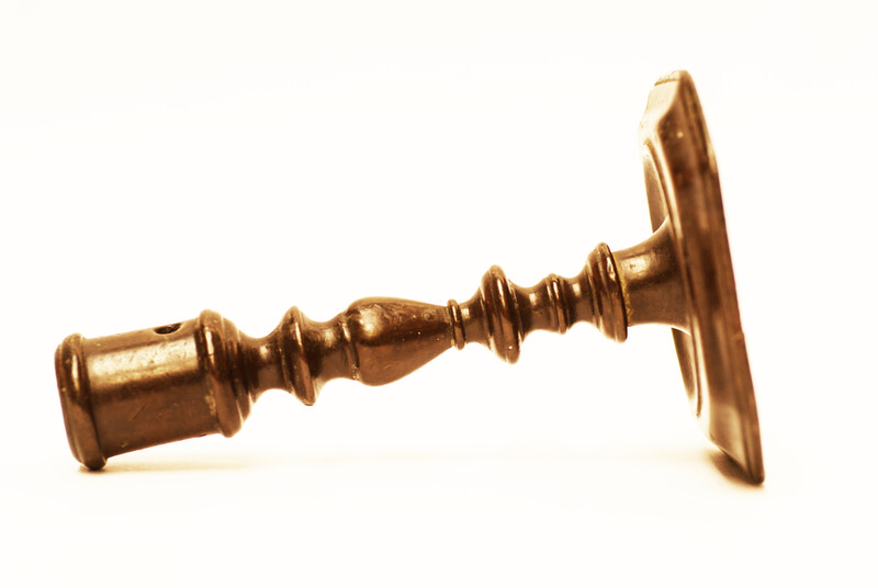 An early seventeenth century bronze Dutch candlestick.