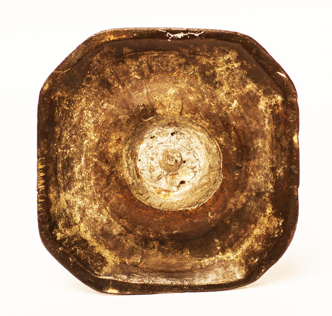 An early seventeenth century bronze Dutch candlestick.