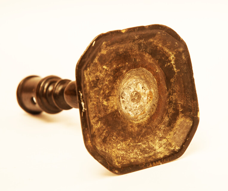 An early seventeenth century bronze Dutch candlestick.