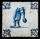 An early seventeenth century Delft blue tile with a Dutch proverb.