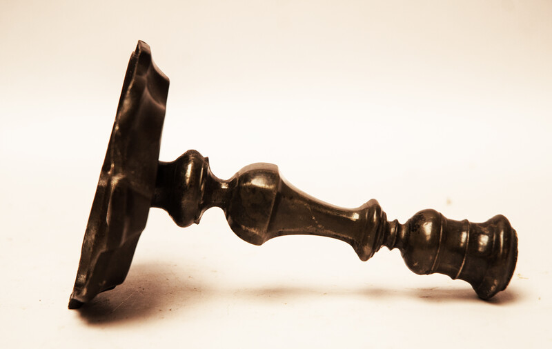 An early seventeenth century pewter candlestick.