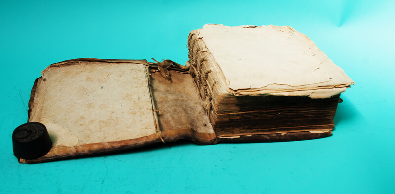 An educational treatise in leather by H.S.van Alphen dated 1708.