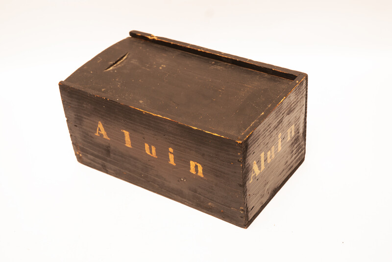 An eighteenth century apothecary box with text 