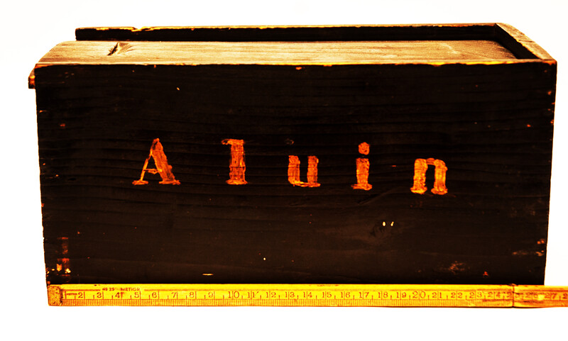 An eighteenth century apothecary box with text 