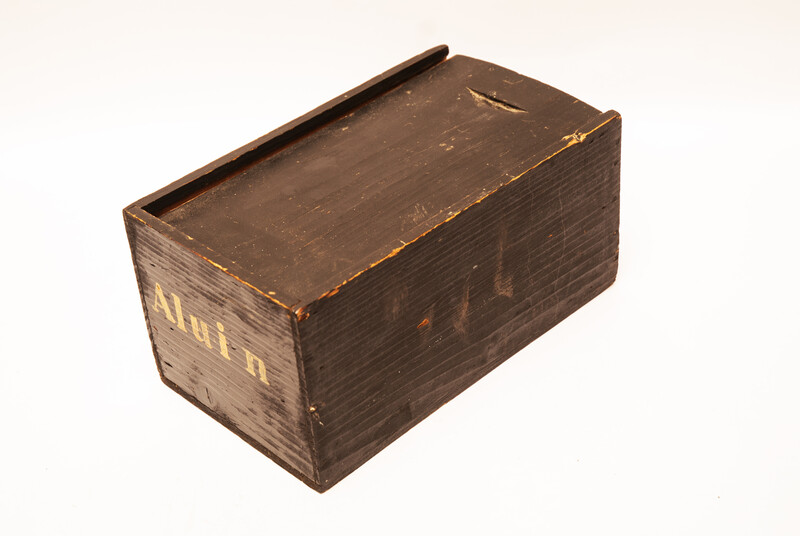 An eighteenth century apothecary box with text 