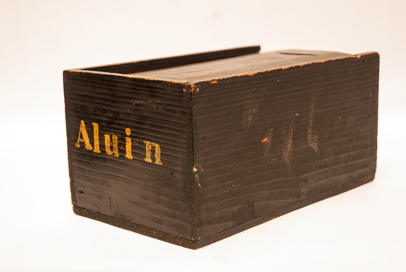 An eighteenth century apothecary box with text 