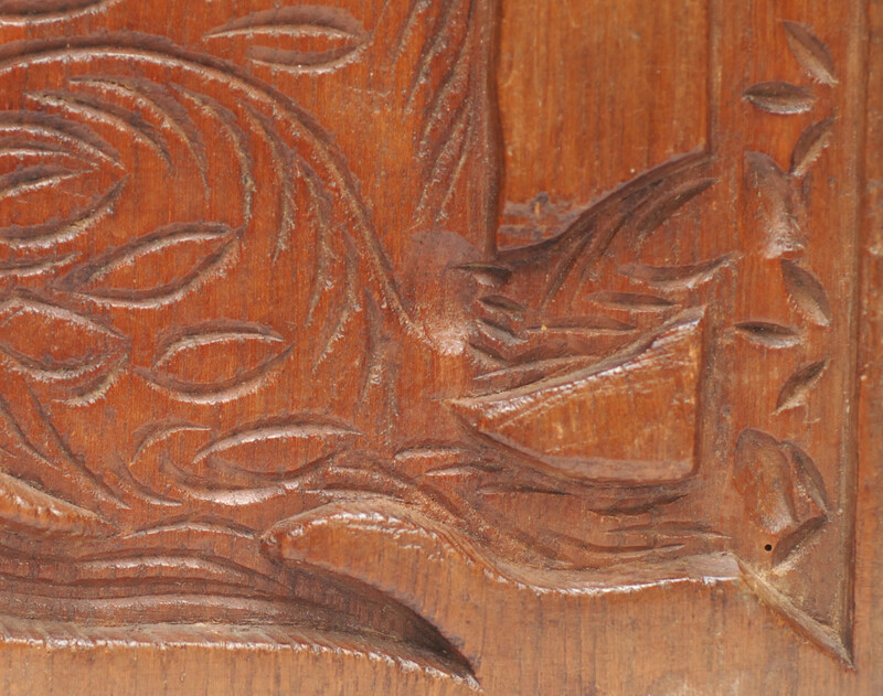 An eighteenth century double sided Dutch cookie mould with a man on a horse and on the other side a cow.