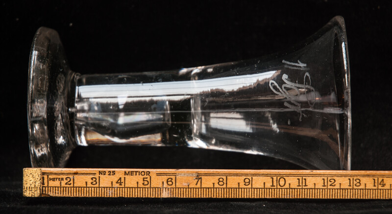 An eighteenth century Dutch glass tot with inscription for medical use.