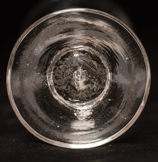 An eighteenth century Dutch glass tot with inscription for medical use.