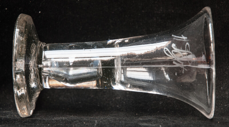 An eighteenth century Dutch glass tot with inscription for medical use.