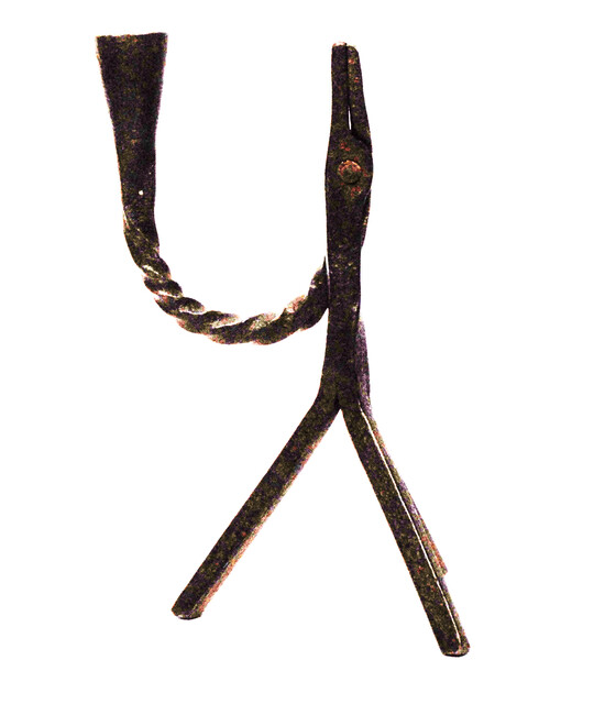 An eighteenth century Dutch rush clamp and candlestick.