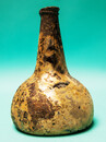 An eighteenth century Dutch wine bottle  from a shipwreck in a tropical sea.