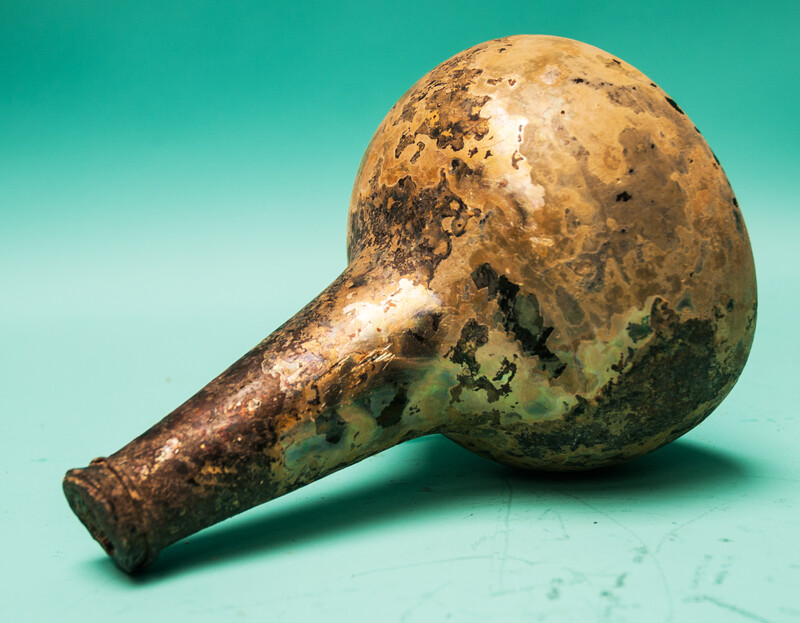 An eighteenth century Dutch wine bottle  from a shipwreck in a tropical sea.