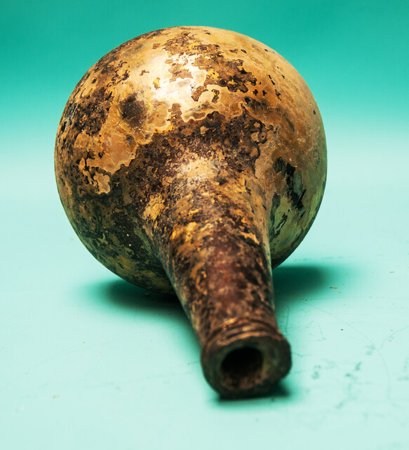 An eighteenth century Dutch wine bottle  from a shipwreck in a tropical sea.