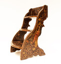An eighteenth century Hindeloopen miniature bed step with parrots on the sides.