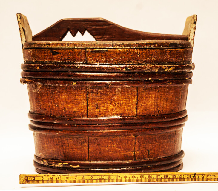 An eighteenth century painted wooden Frisian butter container.