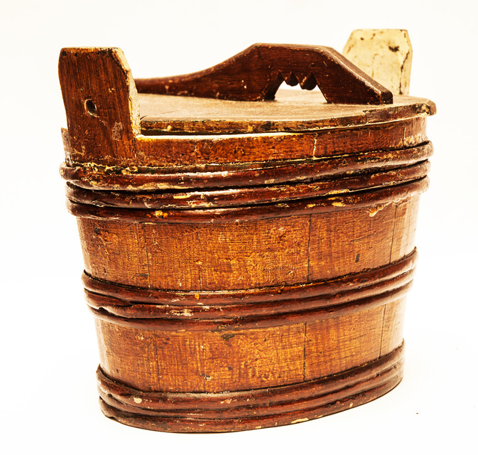 An eighteenth century painted wooden Frisian butter container.