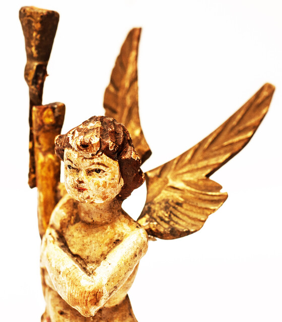 An eighteenth century wooden painted angel made in Zeeland.