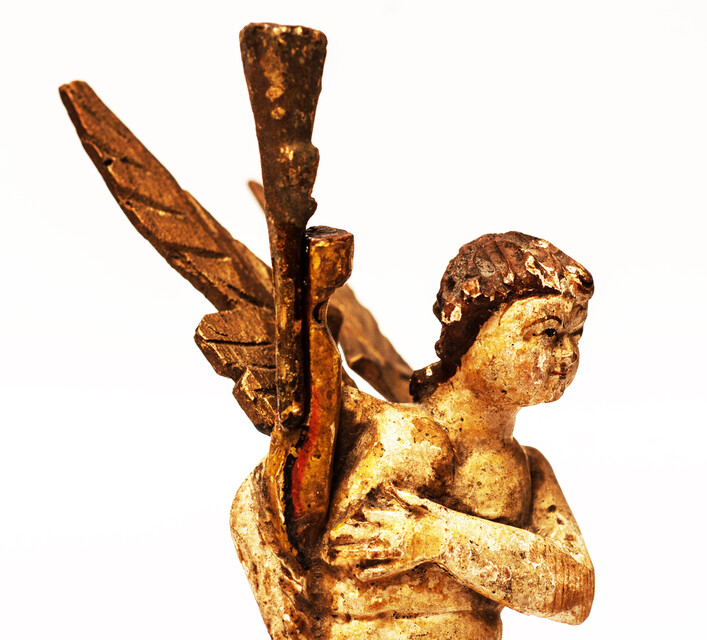 An eighteenth century wooden painted angel made in Zeeland.