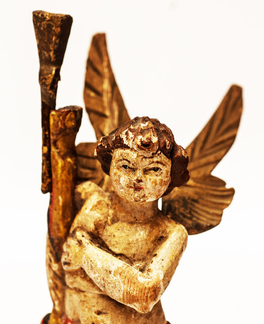 An eighteenth century wooden painted angel made in Zeeland.