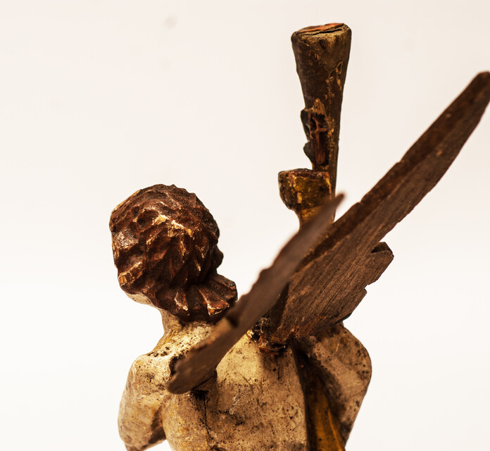 An eighteenth century wooden painted angel made in Zeeland.
