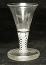 An eightteenth century Dutch firing glass with a twisted stem.