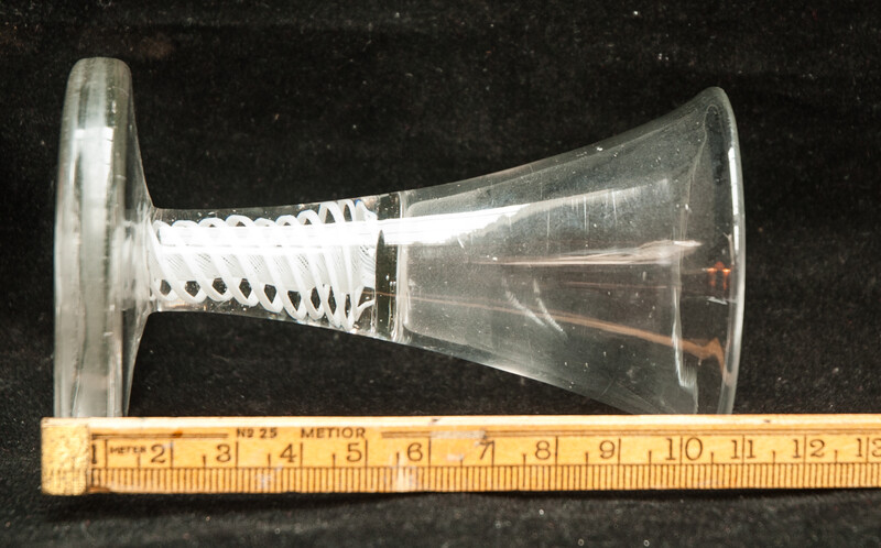 An eightteenth century Dutch firing glass with a twisted stem.