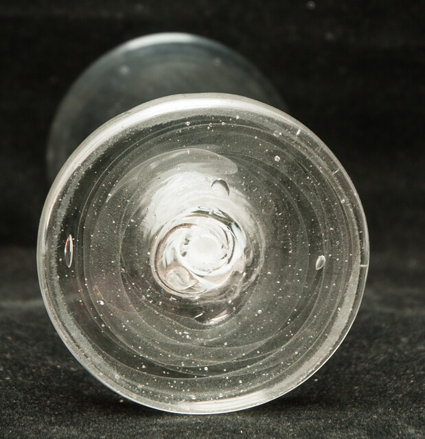 An eightteenth century Dutch firing glass with a twisted stem.
