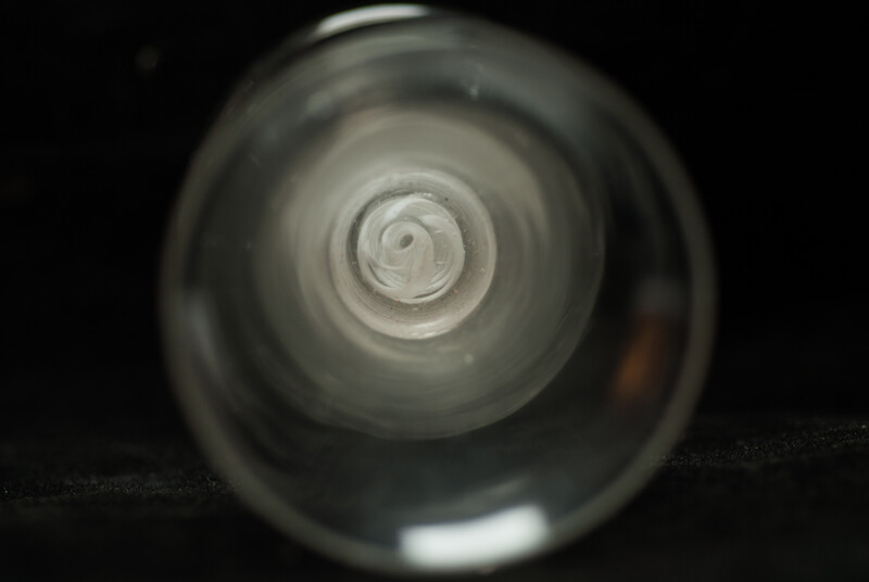 An eightteenth century Dutch firing glass with a twisted stem.