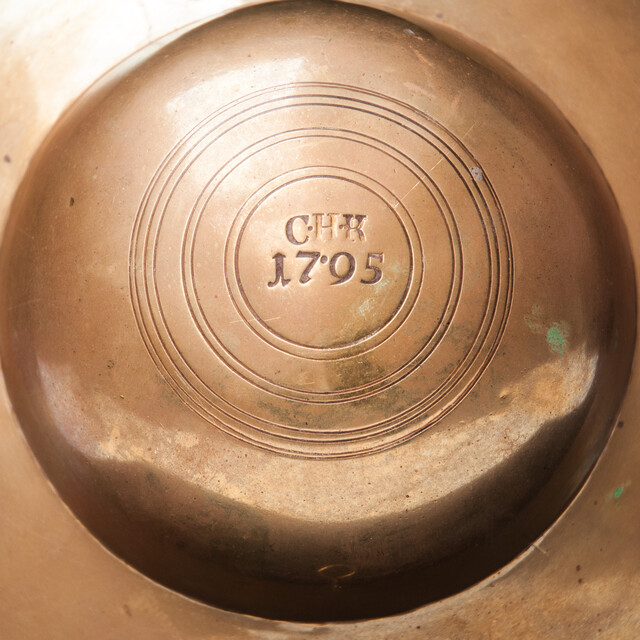 An extremely rare brass bleeding bowl with initials and dated 1795. 