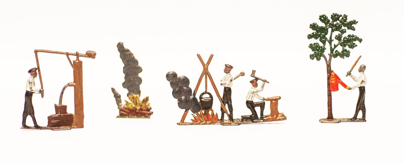 An extremely rare group of 4 three dimensional pewter people in action in the former Dutch colony Suriname. 