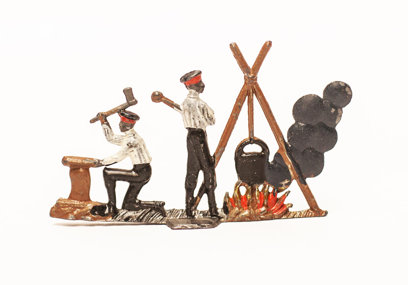 An extremely rare group of 4 three dimensional pewter people in action in the former Dutch colony Suriname. 