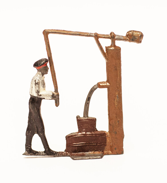 An extremely rare group of 4 three dimensional pewter people in action in the former Dutch colony Suriname. 