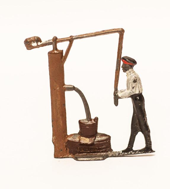 An extremely rare group of 4 three dimensional pewter people in action in the former Dutch colony Suriname. 