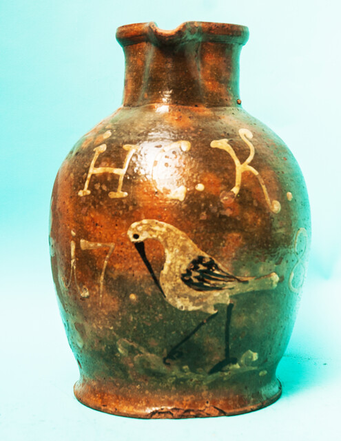 An extremely rare large jug, with initials, a bird and dated 1786.