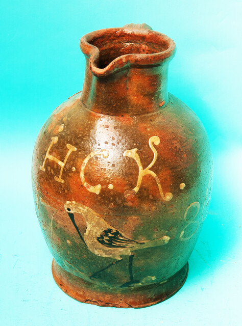 An extremely rare large jug, with initials, a bird and dated 1786.